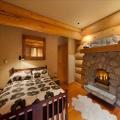 Whistler Log Home Bedroom with Fireplace
