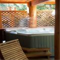 Relax in Creekside Chalet private hot tub.